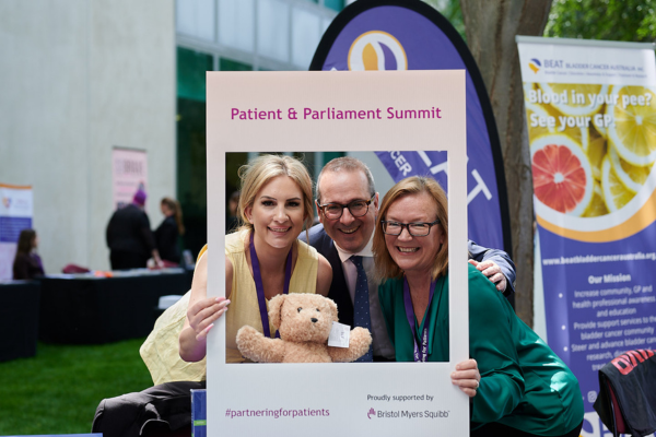 Group with patient, RCA staff member and stakeholder at an event