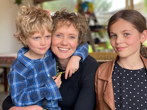 Photo of Amanda with her children.