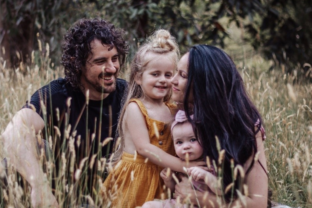 Jolene and her family in a field