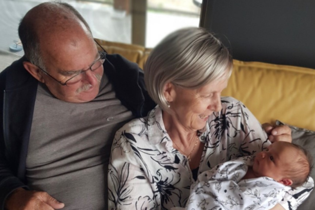 June with her husband and baby granddaughter
